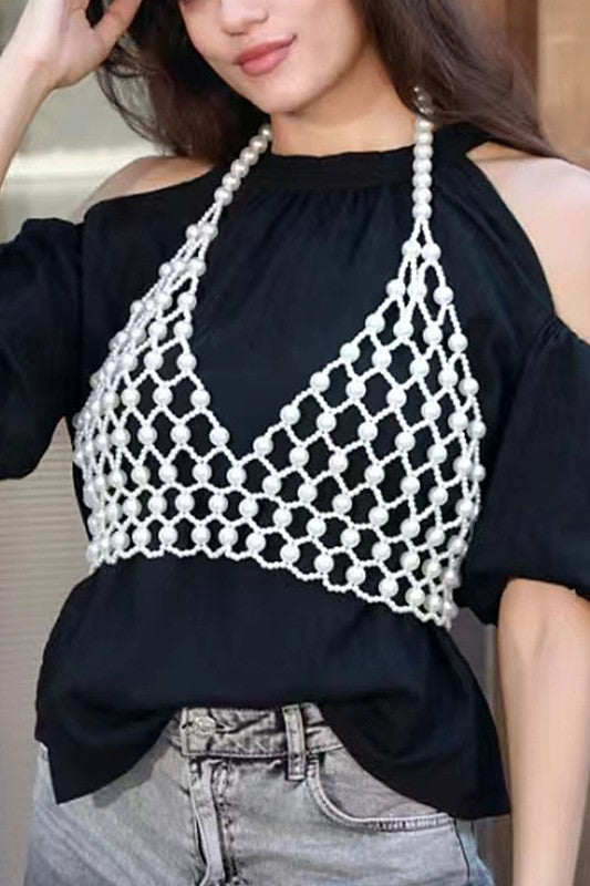Faux Pearl Crochet Braided HalteUpgrade your summer style with our Faux Pearl Crochet Braided Halter Top. The intricate braided detailing adds a touch of elegance, while the faux pearl embellishments elevate the look. Perfect for any occasion, this crop top will make you stand out with its unique style