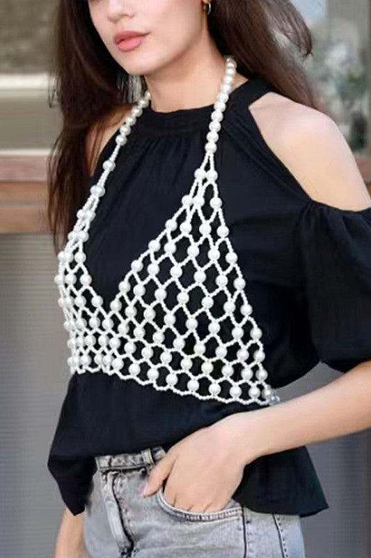 Faux Pearl Crochet Braided HalteUpgrade your summer style with our Faux Pearl Crochet Braided Halter Top. The intricate braided detailing adds a touch of elegance, while the faux pearl embellishments elevate the look. Perfect for any occasion, this crop top will make you stand out with its unique style