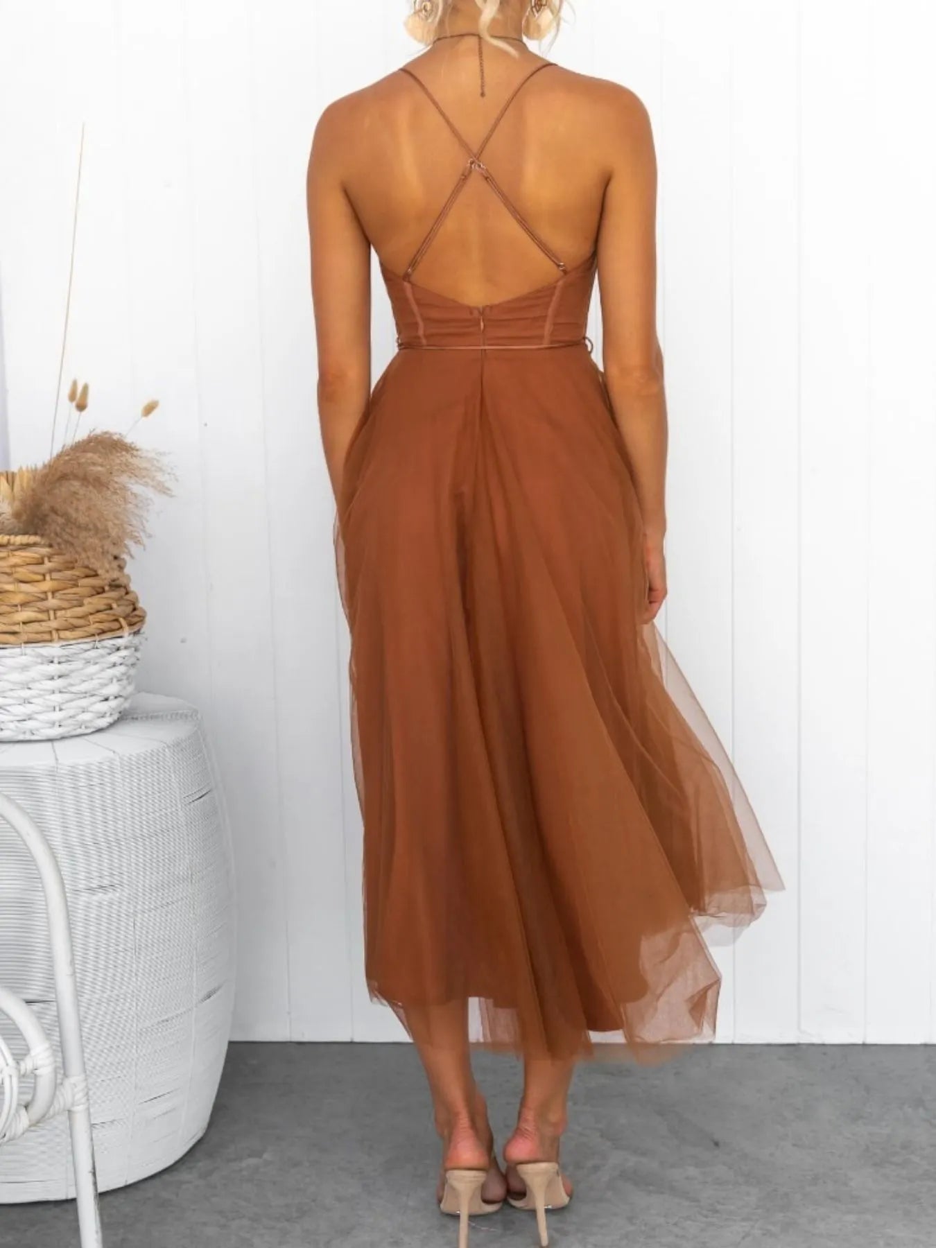 Turn heads with the Sweetheart Neck Tulle Midi Dress, designed to captivate. Its delicate tulle fabric and flattering sweetheart neckline create a bold yet elegant silhouette, perfect for making a daring statement at any event. Embrace your confidence and let this dress highlight your fearless style.