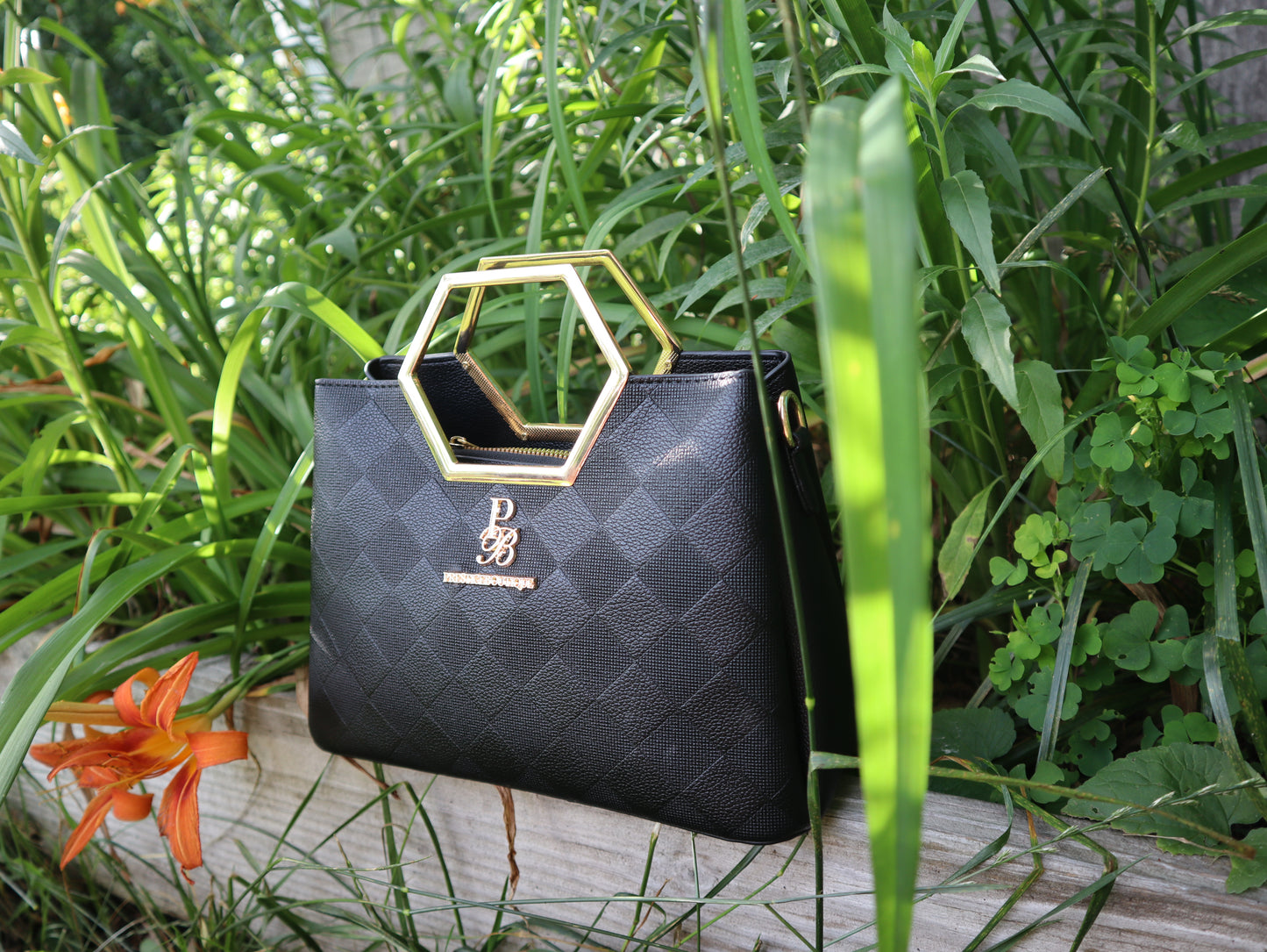 Make a fearless statement with The Hex Appeal Prestige Boutique Crossbody Handbag. This daring accessory combines high-end sophistication with practical design. Its large capacity and secure zipper keep your essentials safe while making a bold statement wherever you go. Perfect for those who refuse to blend in. Black and god purse
