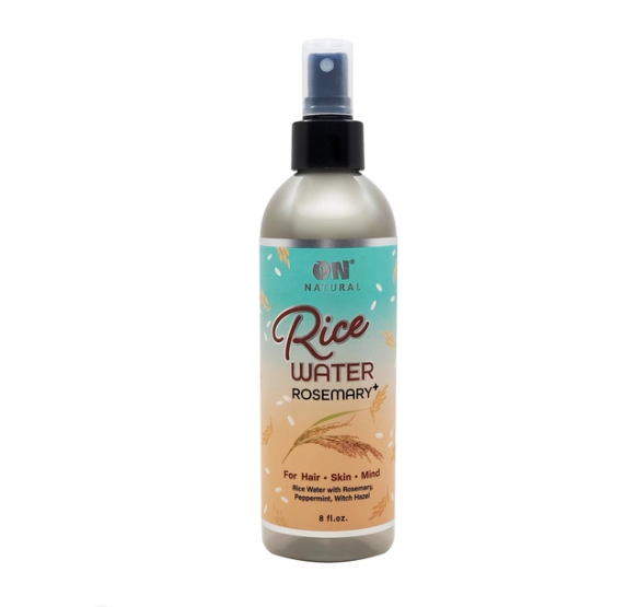 A bottle of ON Natural Rice Water Rosemary spray for hair, skin, and mind with an 8 oz label.