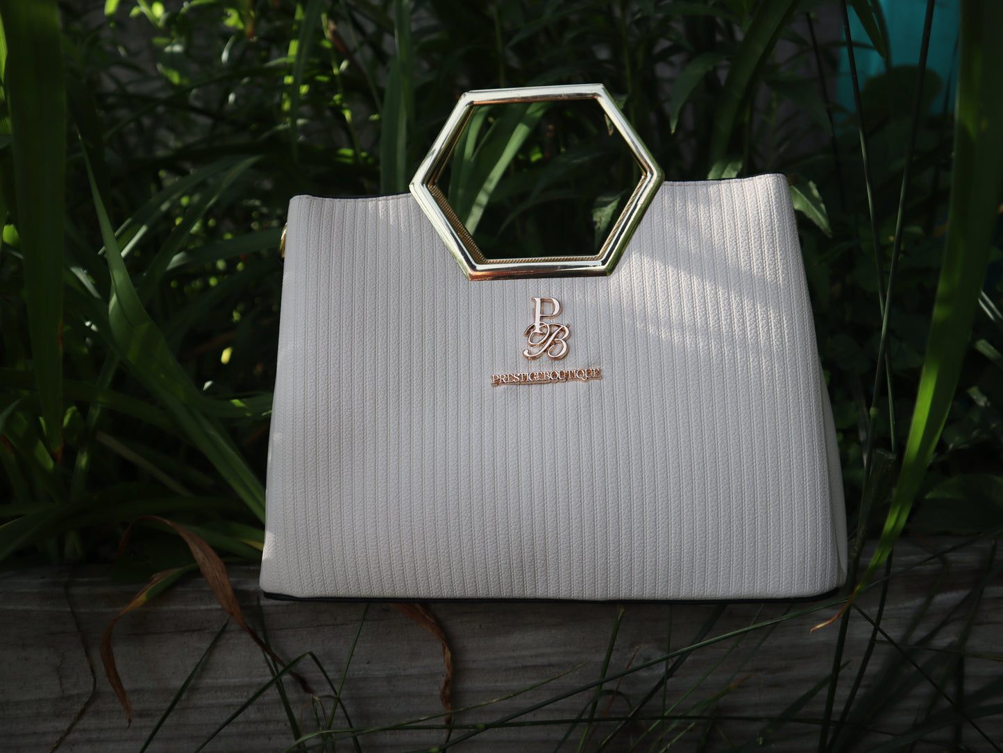 Make a fearless statement with The Hex Appeal Prestige Boutique Crossbody Handbag. This daring accessory combines high-end sophistication with practical design. Its large capacity and secure zipper keep your essentials safe while making a bold statement wherever you go. Perfect for those who refuse to blend in.