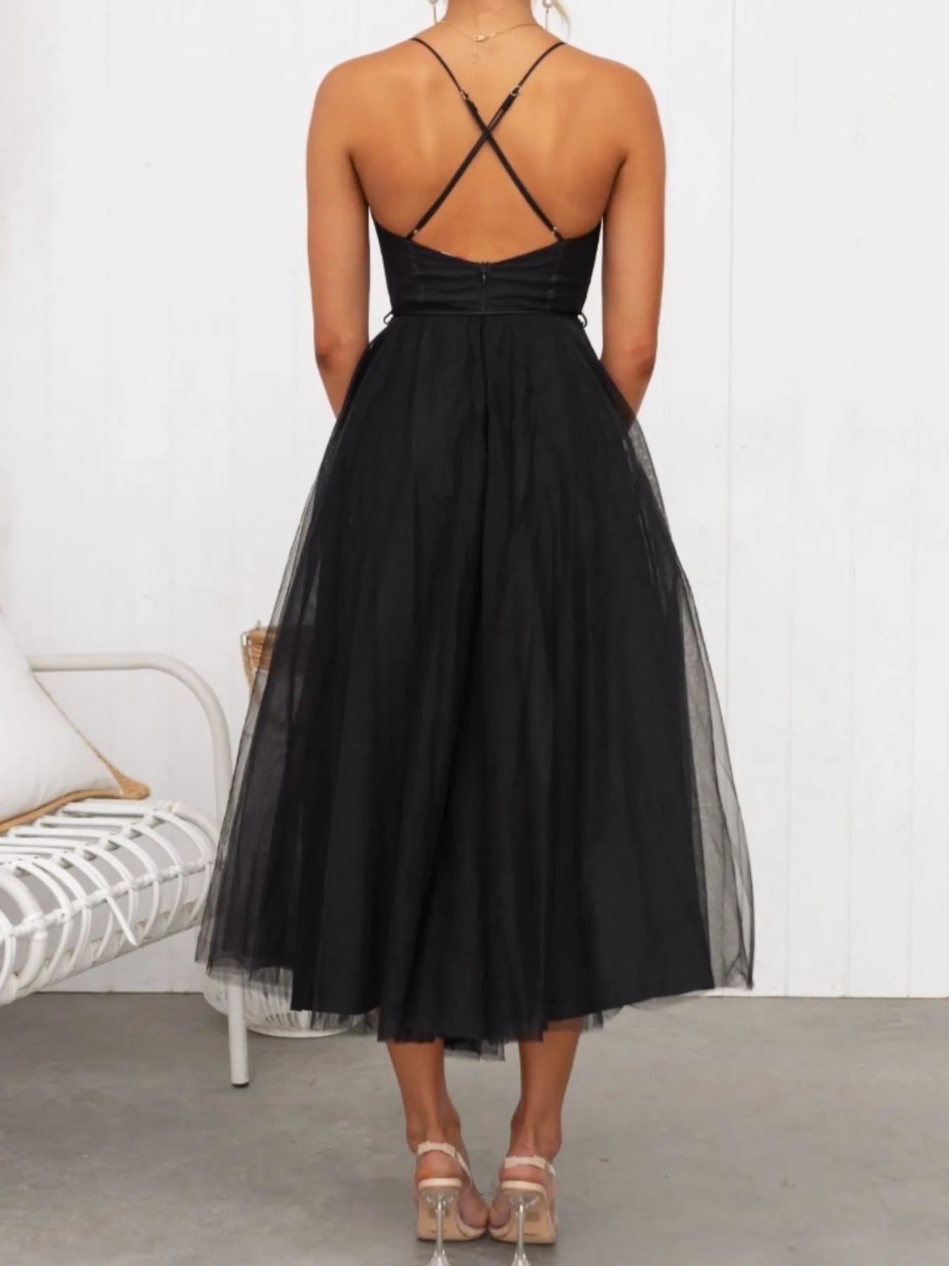 Turn heads with the Sweetheart Neck Tulle Midi Dress, designed to captivate. Its delicate tulle fabric and flattering sweetheart neckline create a bold yet elegant silhouette, perfect for making a daring statement at any event. Embrace your confidence and let this dress highlight your fearless style.