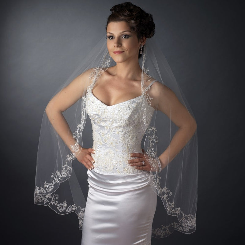 Bridal wedding single-layer waltz-length veil with couture embroidery, enhancing elegance for a bride's special day.