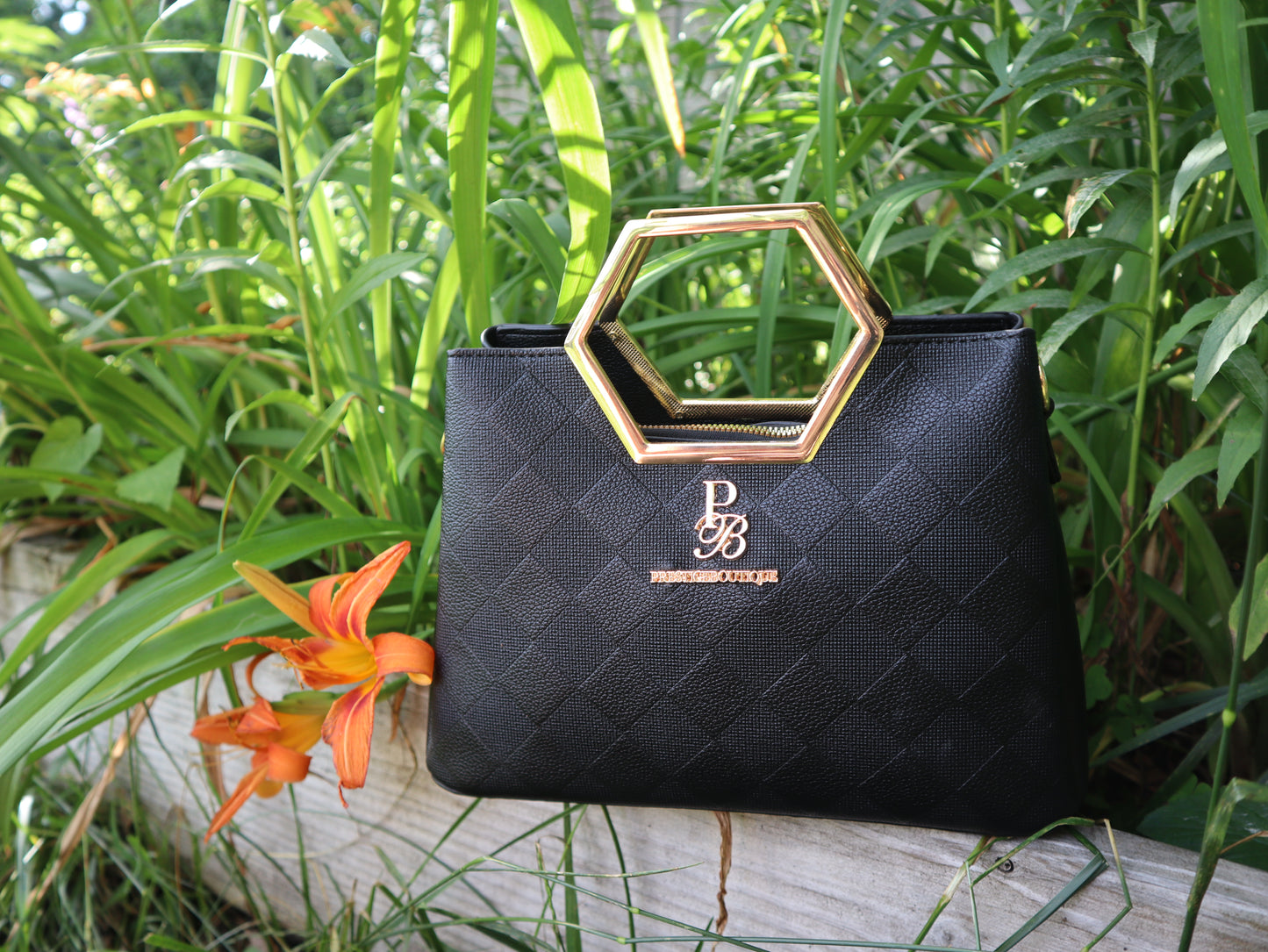 checkered diamond black hexagon handled crossbody large hand bag
