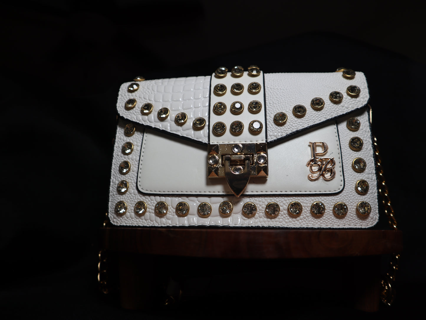 studs & sass rhinestone studded handbag from Prestige Boutique