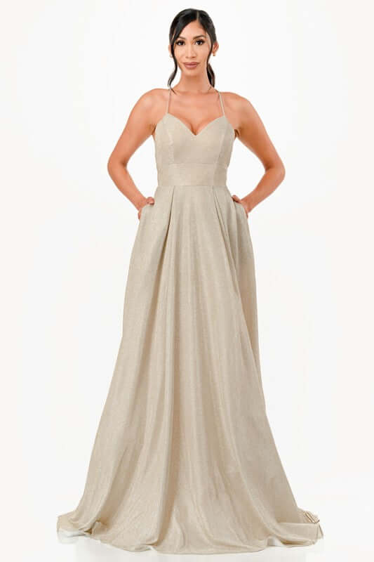 Elegant glitter gown with sleeveless design and pockets, perfect for prom or formal events.