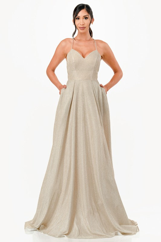 Elegant glitter gown with sleeveless design and pockets, perfect for prom or formal events.