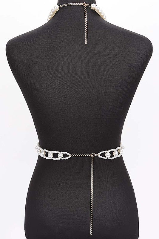 Faux Pearl Crochet Braided HalteUpgrade your summer style with our Faux Pearl Crochet Braided Halter Top. The intricate braided detailing adds a touch of elegance, while the faux pearl embellishments elevate the look. Perfect for any occasion, this crop top will make you stand out with its unique style