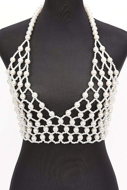Faux Pearl Crochet Braided HalteUpgrade your summer style with our Faux Pearl Crochet Braided Halter Top. The intricate braided detailing adds a touch of elegance, while the faux pearl embellishments elevate the look. Perfect for any occasion, this crop top will make you stand out with its unique style crop top

One Size Fits Most
PVC
Faux Pearl Crochet Braided Halter Top