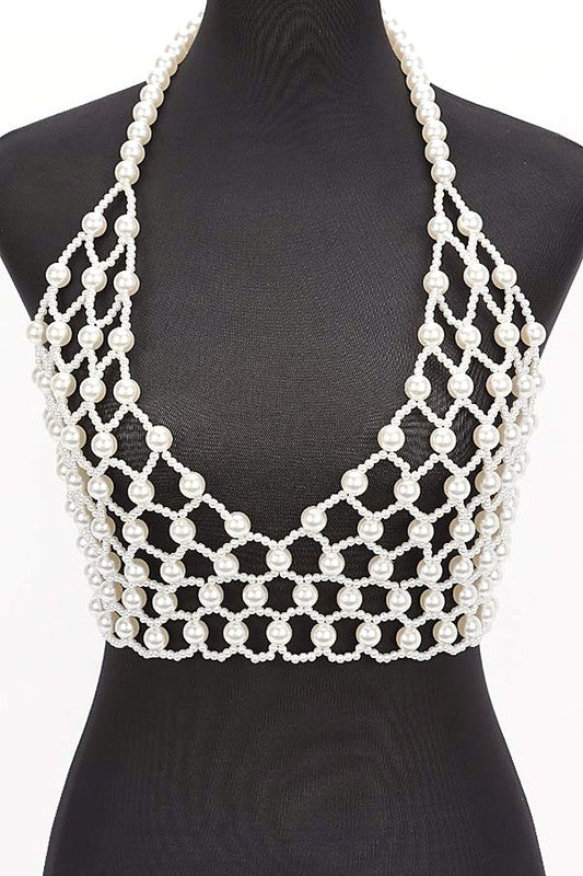 Faux Pearl Crochet Braided HalteUpgrade your summer style with our Faux Pearl Crochet Braided Halter Top. The intricate braided detailing adds a touch of elegance, while the faux pearl embellishments elevate the look. Perfect for any occasion, this crop top will make you stand out with its unique style crop top

One Size Fits Most
PVC
Faux Pearl Crochet Braided Halter Top