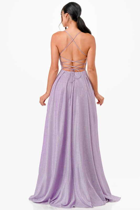 Back view of a sleeveless glitter gown in lavender, featuring a lace-up design, perfect for prom or special occasions.