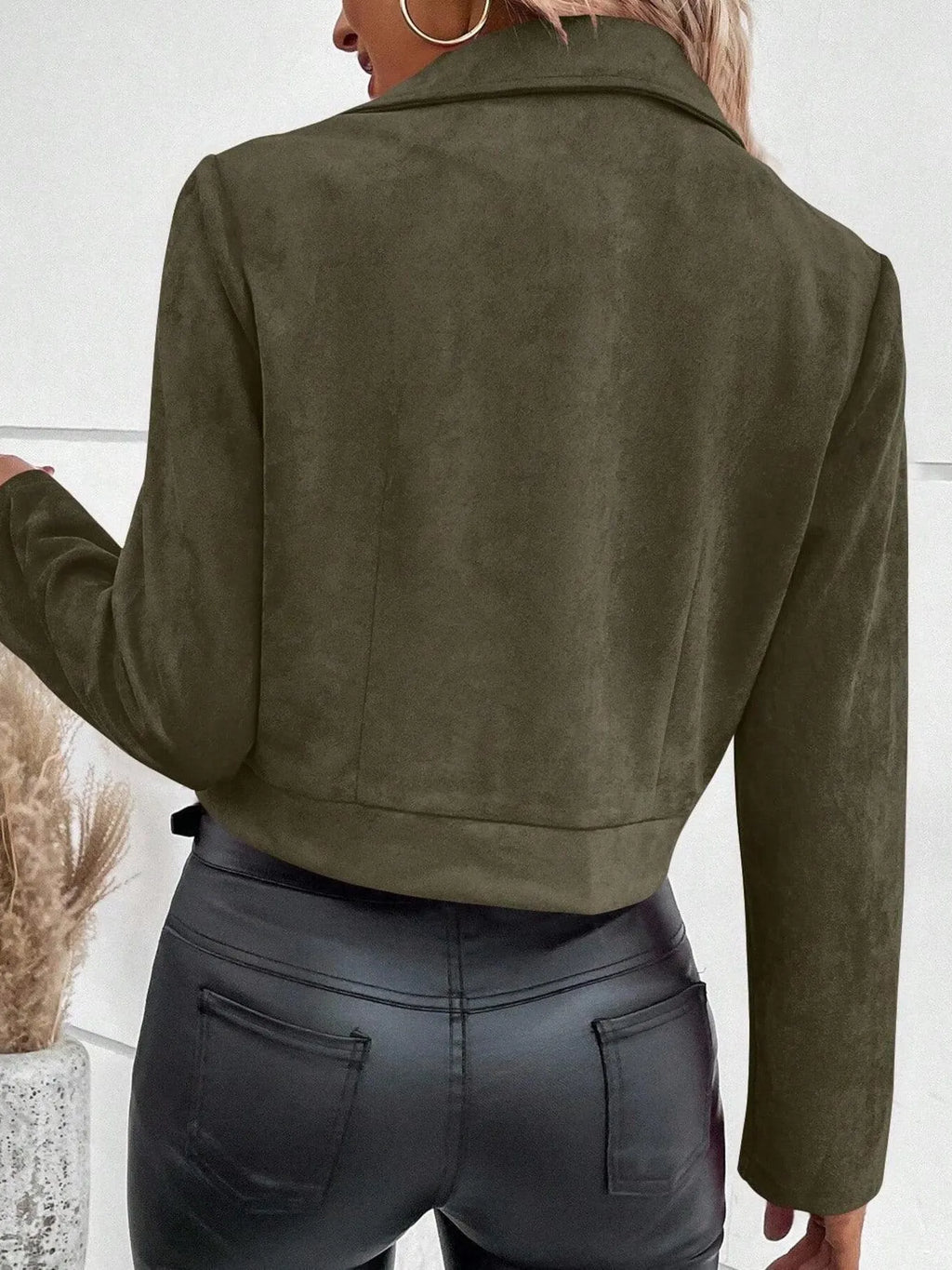 Women's Zip Up Suede Cropped Moto Jacket displayed from the back, showcasing its stylish cropped design and soft suede fabric.