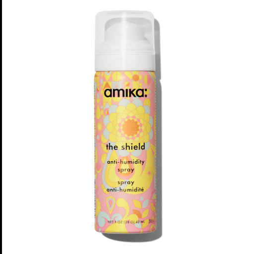 Amika anti-humidity spray can with colorful label on a white background