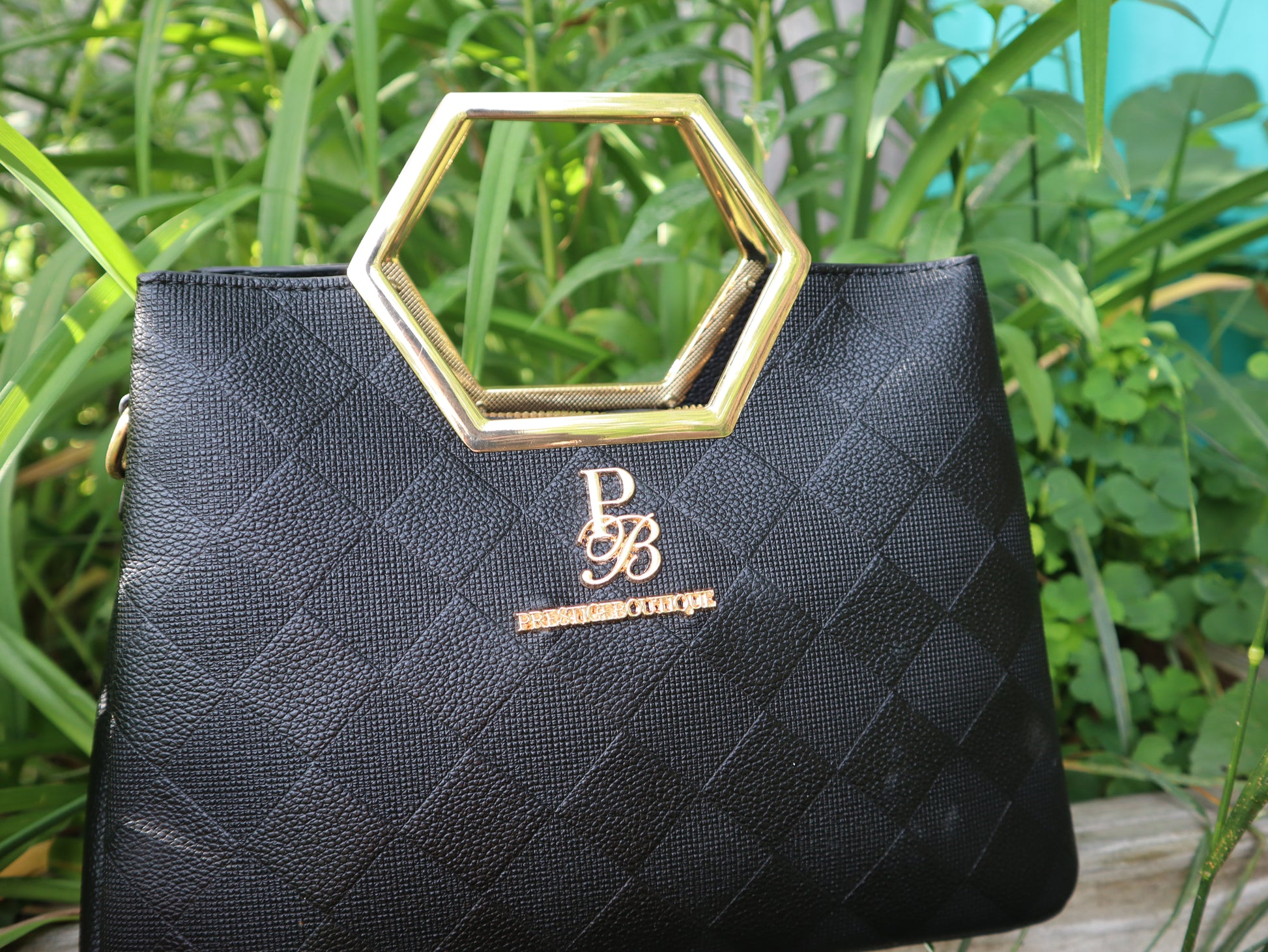 Make a fearless statement with The Hex Appeal Prestige Boutique Crossbody Handbag. This daring accessory combines high-end sophistication with practical design. Its large capacity and secure zipper keep your essentials safe while making a bold statement wherever you go. Perfect for those who refuse to blend in.