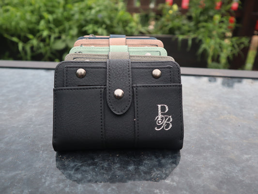 Discover the Prestige Boutique Mini Book Wallet—a bold blend of style and function. Compact yet spacious, it keeps your essentials organized while making a fearless fashion statement. Perfect for those who dare to carry less but demand more.