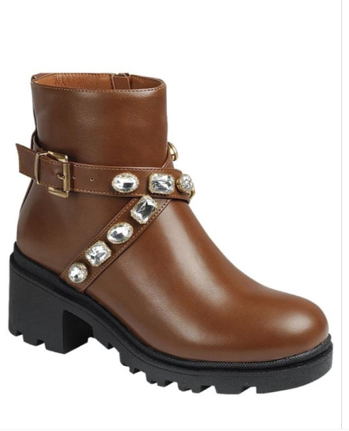 Brown leather boot with embellishments on a white background