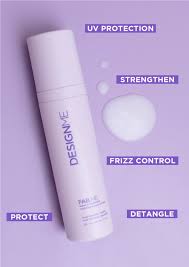 Hair product bottle with text on a purple background
