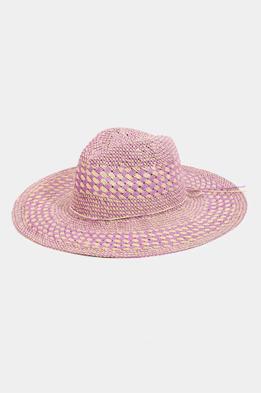 The Checkered Straw Weave Sun Hat is a stylish and practical accessory for sunny days. Its checkered pattern adds a touch of charm and sophistication to your outfit. Made of straw weave, this hat provides breathability and keeps you cool in warm weather. The wide brim offers ample shade and sun protection for your face and neck. Perfect for beach days, picnics, or outdoor events, this hat is both fashionable and functional. Stay chic and shielded from the sun with this trendy checkered straw weave sun hat.