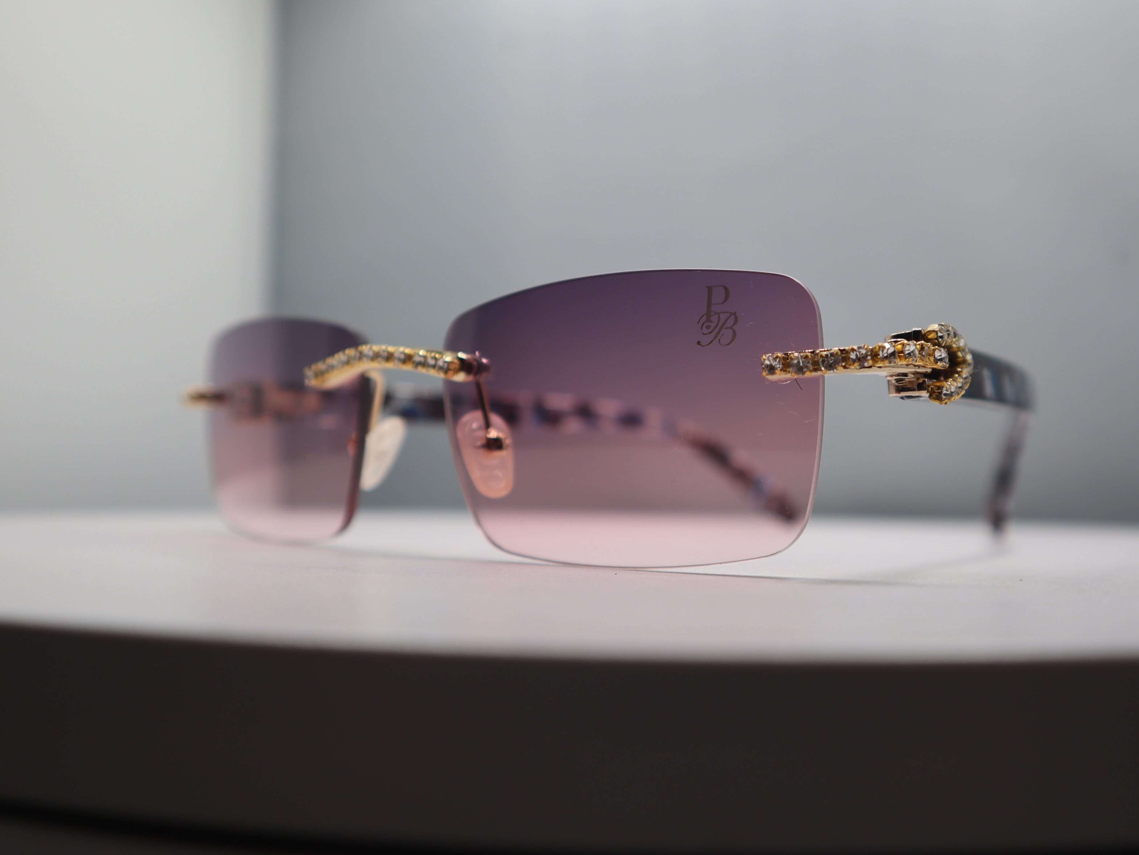 Prestige Boutique Pink Floral Fashionista Sunglasses from Hidden Gems Collection, stylish with gradient lenses and sparkling details.