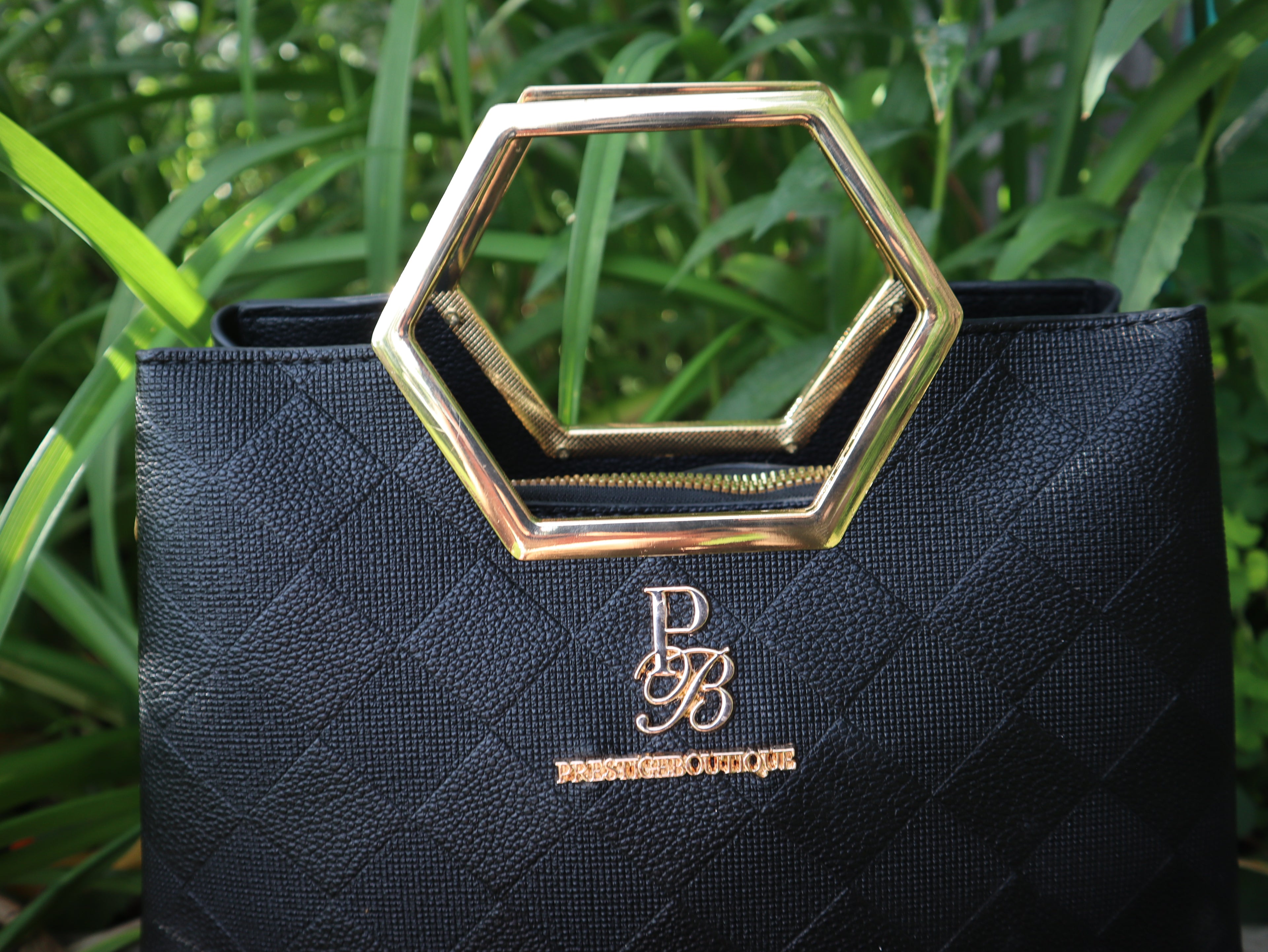 Make a fearless statement with The Hex Appeal Prestige Boutique Crossbody Handbag. This daring accessory combines high-end sophistication with practical design. Its large capacity and secure zipper keep your essentials safe while making a bold statement wherever you go. Perfect for those who refuse to blend in.