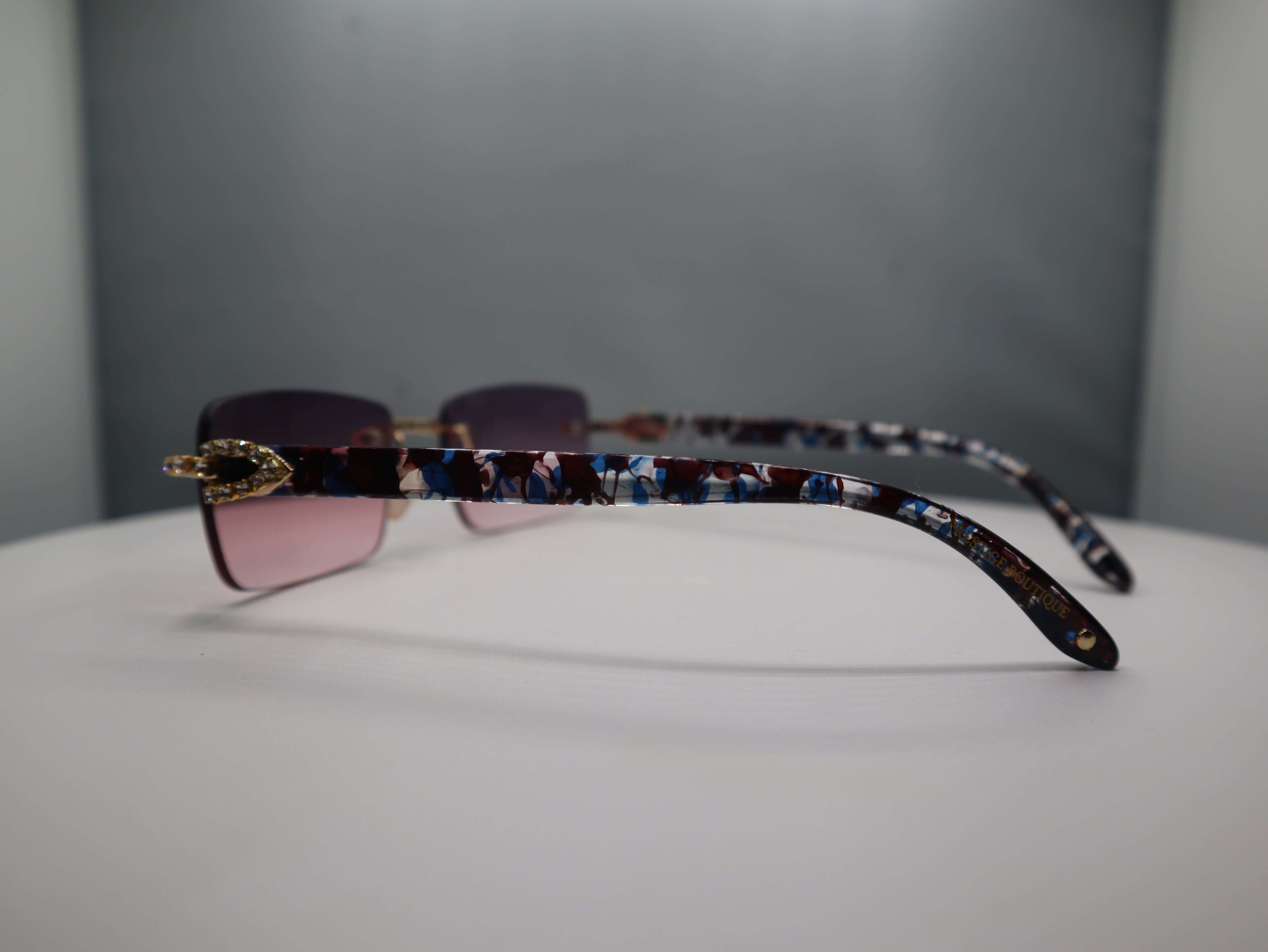 Prestige Boutique Pink Floral Fashionista sunglasses with floral pattern arms and gradient pink lenses.
