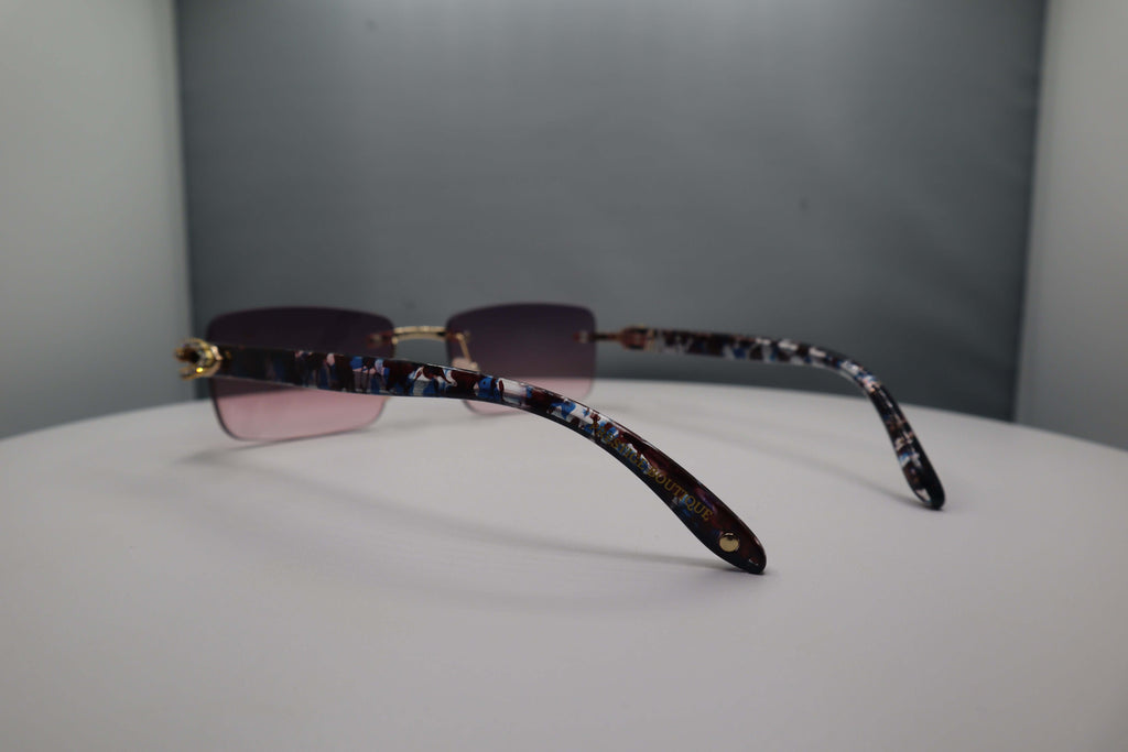 Prestige Boutique Pink Floral Fashionista Sunglasses with unique patterned arms and gradient lenses.