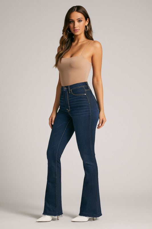 Judy Bootcut Premium Stretch Jean model wearing soft stretch denim with a high waistband and flared leg design.
