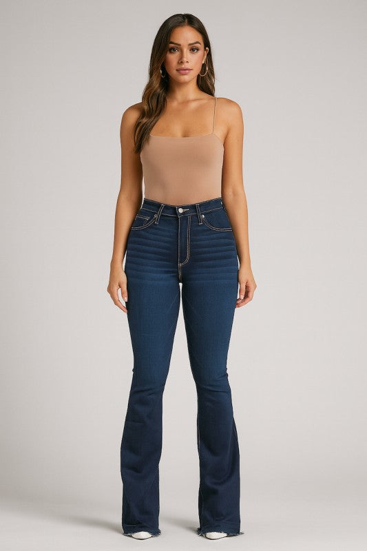 Judy Bootcut Premium Stretch Jean on a model, showcasing high stretch denim, button and zipper closure, and flared leg design.