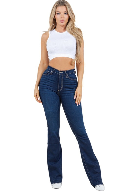 Judy Bootcut Women's Jeans worn by model, featuring a high waist and bootcut silhouette, made from soft stretch denim.