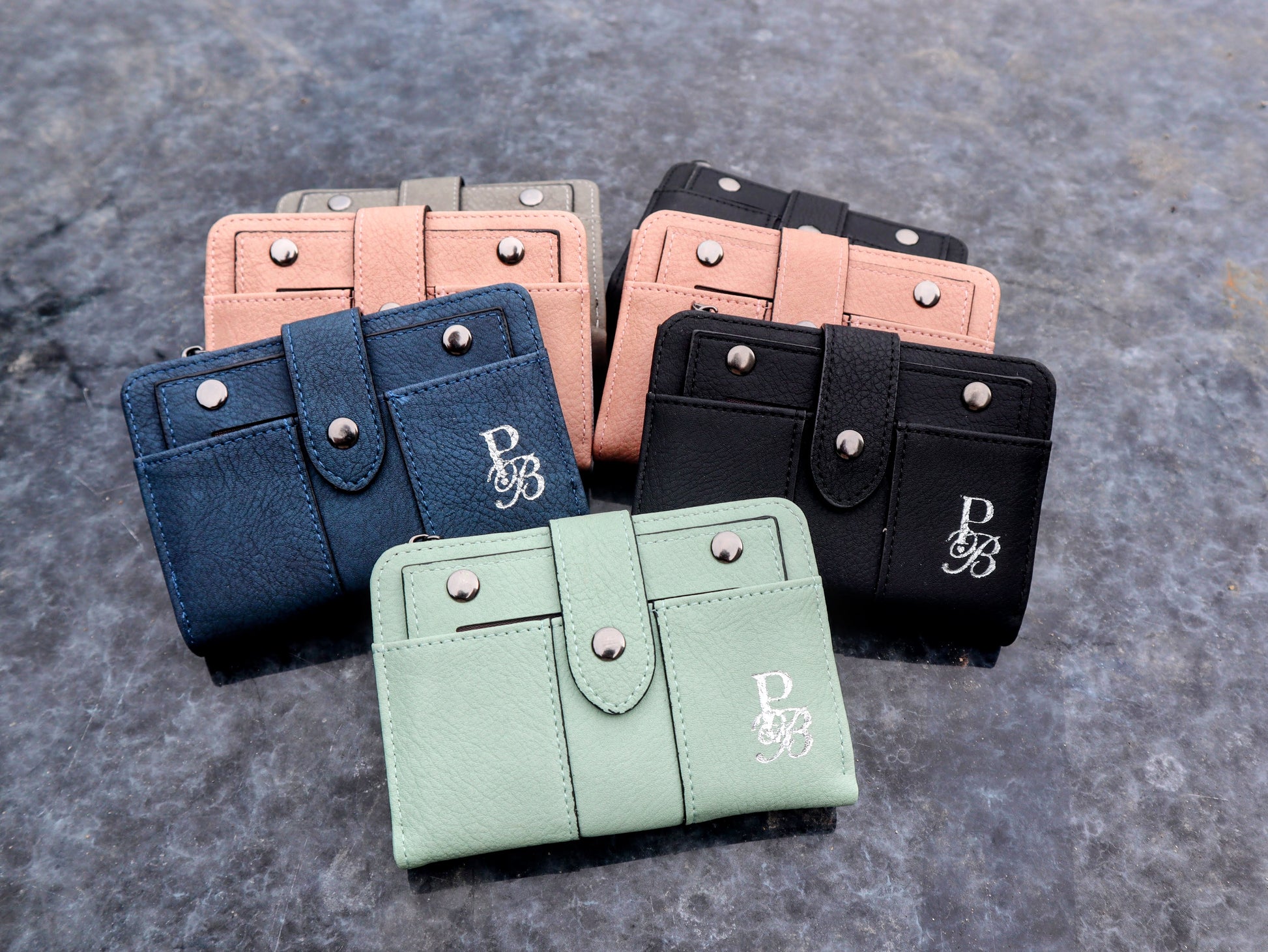 Discover the Prestige Boutique Mini Book Wallet—a bold blend of style and function. Compact yet spacious, it keeps your essentials organized while making a fearless fashion statement. Perfect for those who dare to carry less but demand more.