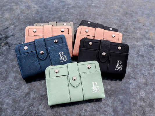 Discover the Prestige Boutique Mini Book Wallet—a bold blend of style and function. Compact yet spacious, it keeps your essentials organized while making a fearless fashion statement. Perfect for those who dare to carry less but demand more.