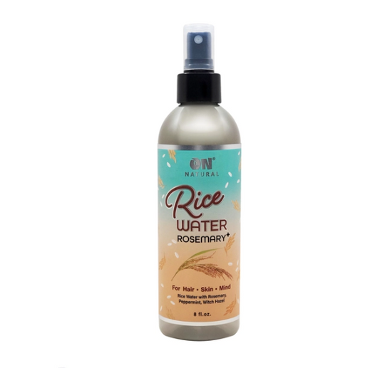 A bottle of ON Natural Rice Water Rosemary spray for hair, skin, and mind with an 8 oz label.