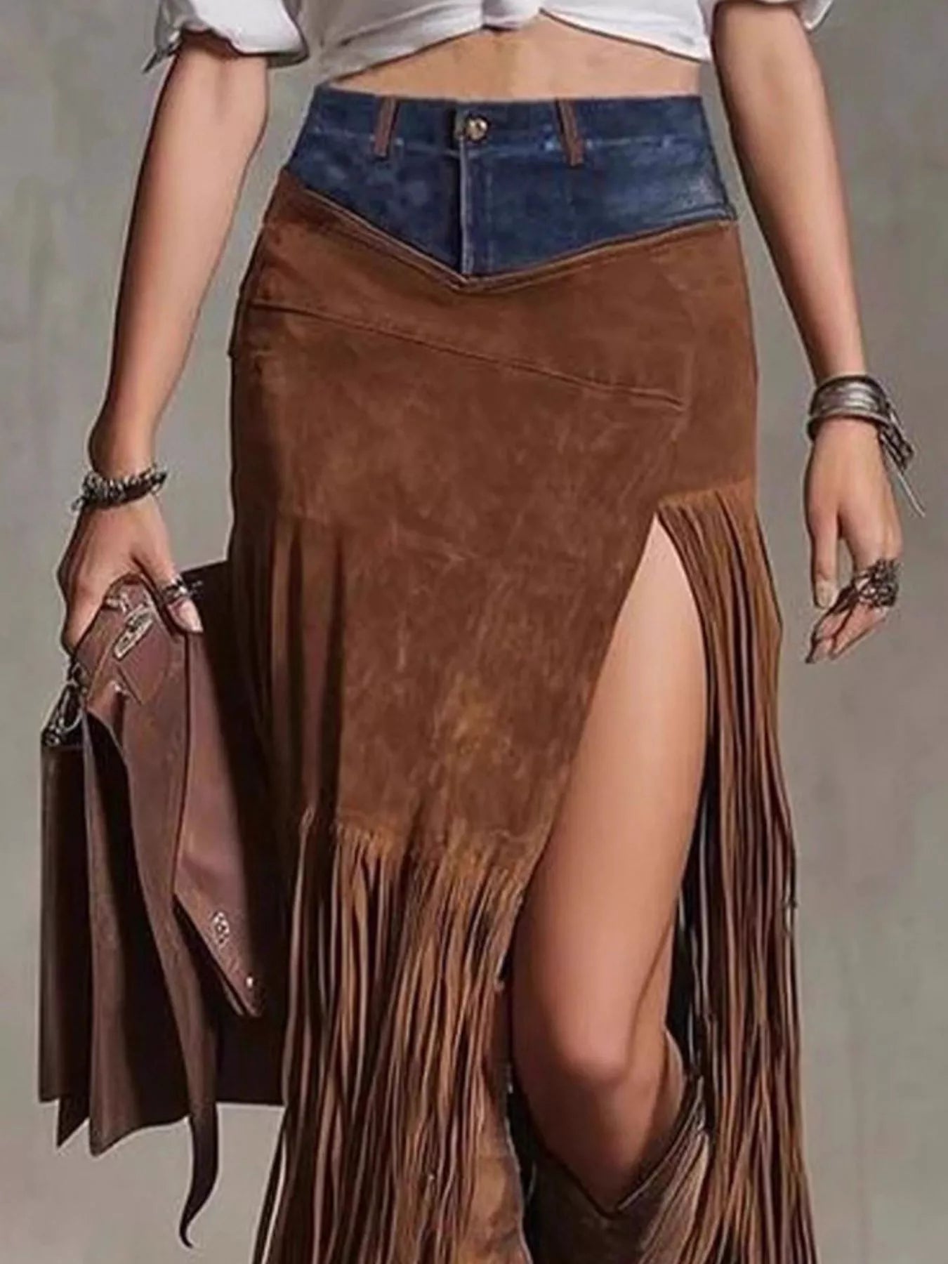 Western Denim Patchwork Fringe Maxi Skirt featuring split fringe design and rich brown tones.