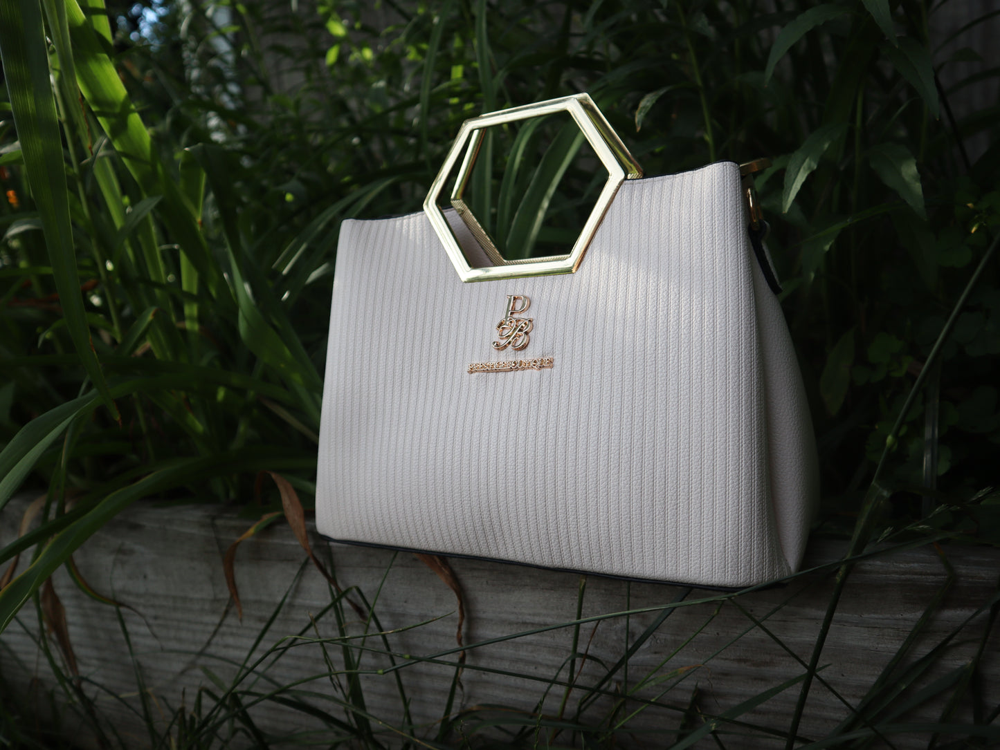 Make a fearless statement with The Hex Appeal Prestige Boutique Crossbody Handbag. This daring accessory combines high-end sophistication with practical design. Its large capacity and secure zipper keep your essentials safe while making a bold statement wherever you go. Perfect for those who refuse to blend in. white and gold. Outfit inspo for women. Business casual attire. Evening attire. Outfit ideas