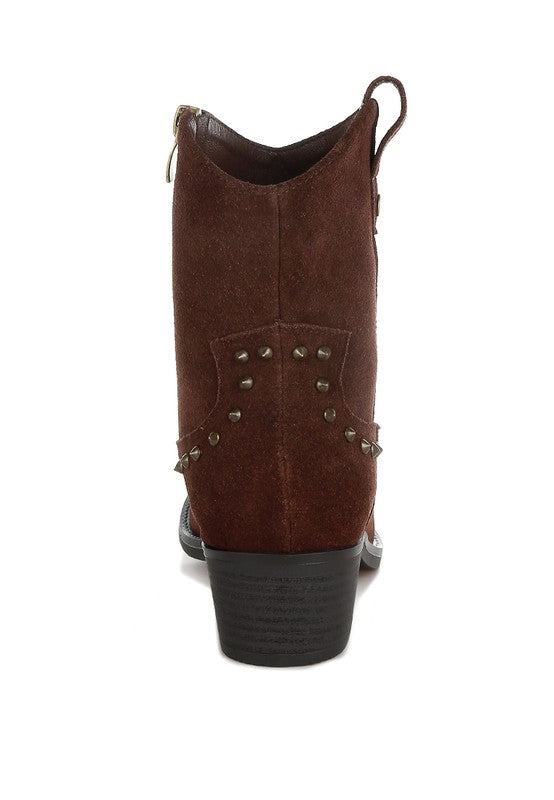 Brown leather boot with studded details on a white background