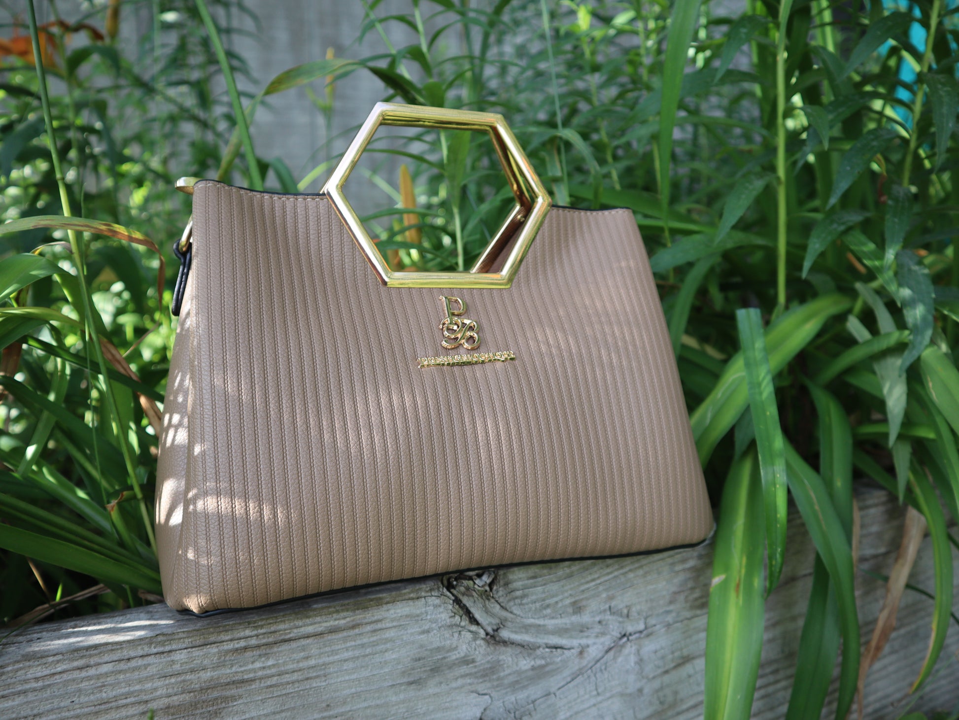beige purse Make a fearless statement with The Hex Appeal Prestige Boutique Crossbody Handbag. This daring accessory combines high-end sophistication with practical design. Its large capacity and secure zipper keep your essentials safe while making a bold statement wherever you go. Perfect for those who refuse to blend in.