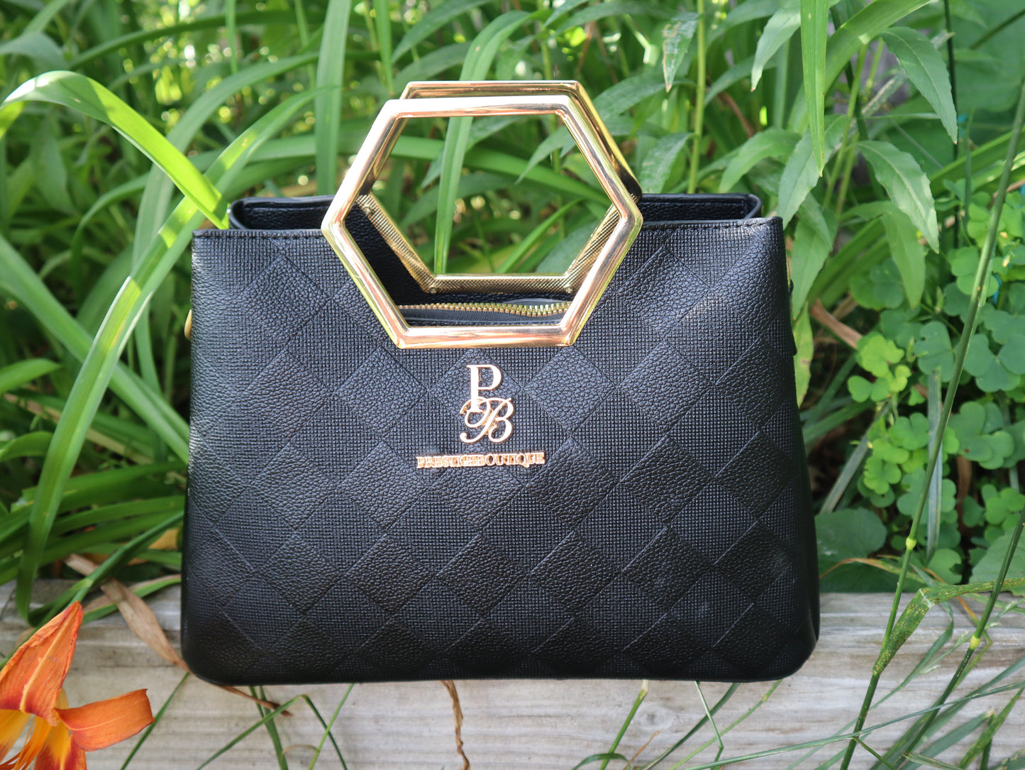 Make a fearless statement with The Hex Appeal Prestige Boutique Crossbody Handbag. This daring accessory combines high-end sophistication with practical design. Its large capacity and secure zipper keep your essentials safe while making a bold statement wherever you go. Perfect for those who refuse to blend in.