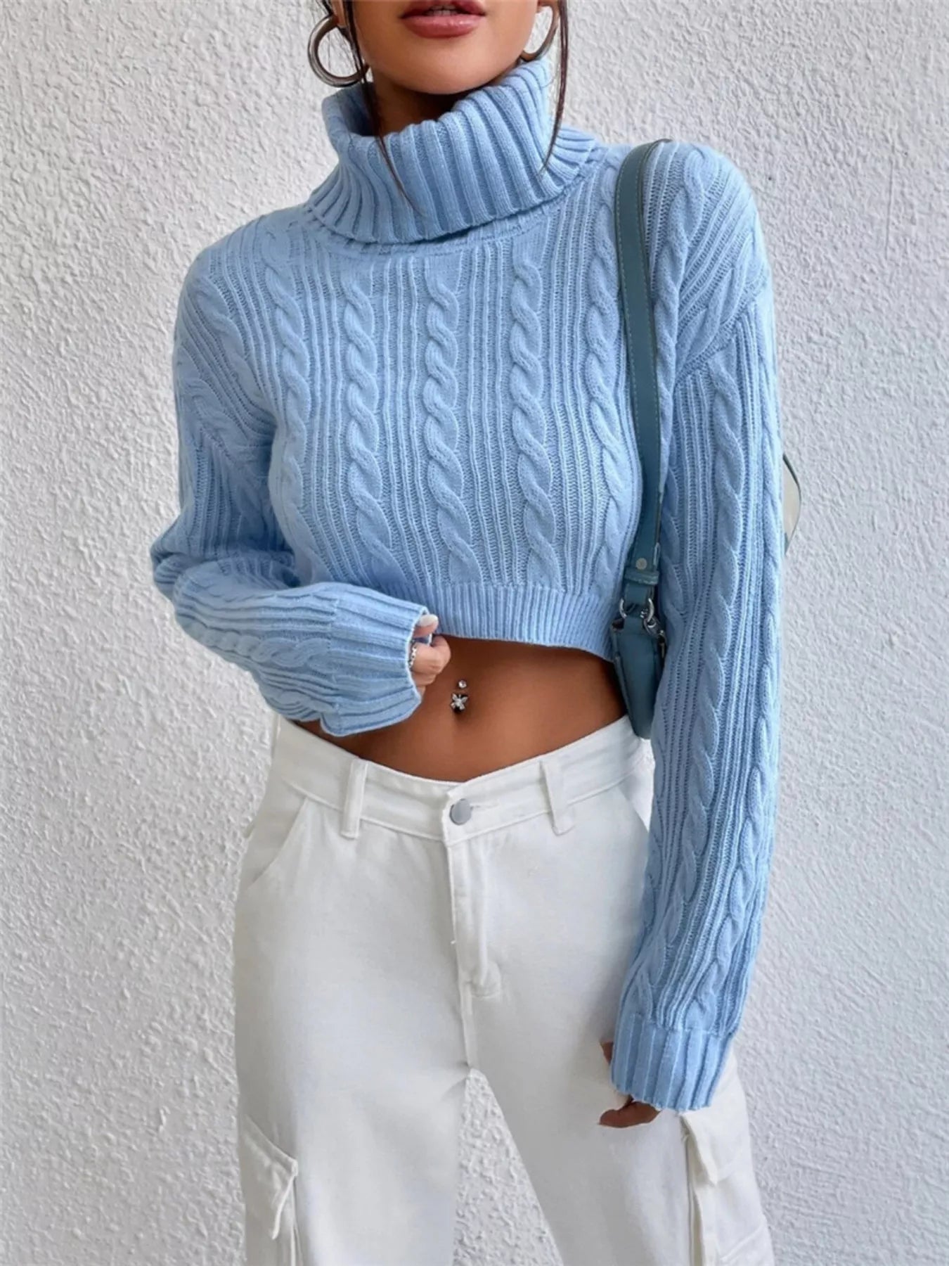 Cable-Knit Turtleneck Long Sleeve Sweater in light blue, featuring a cropped design and stylish cable-knit texture.