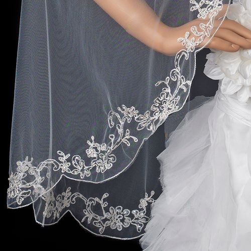 Bridal wedding veil with couture embroidery, single-layer, waltz length, perfect for elegant bridal looks.