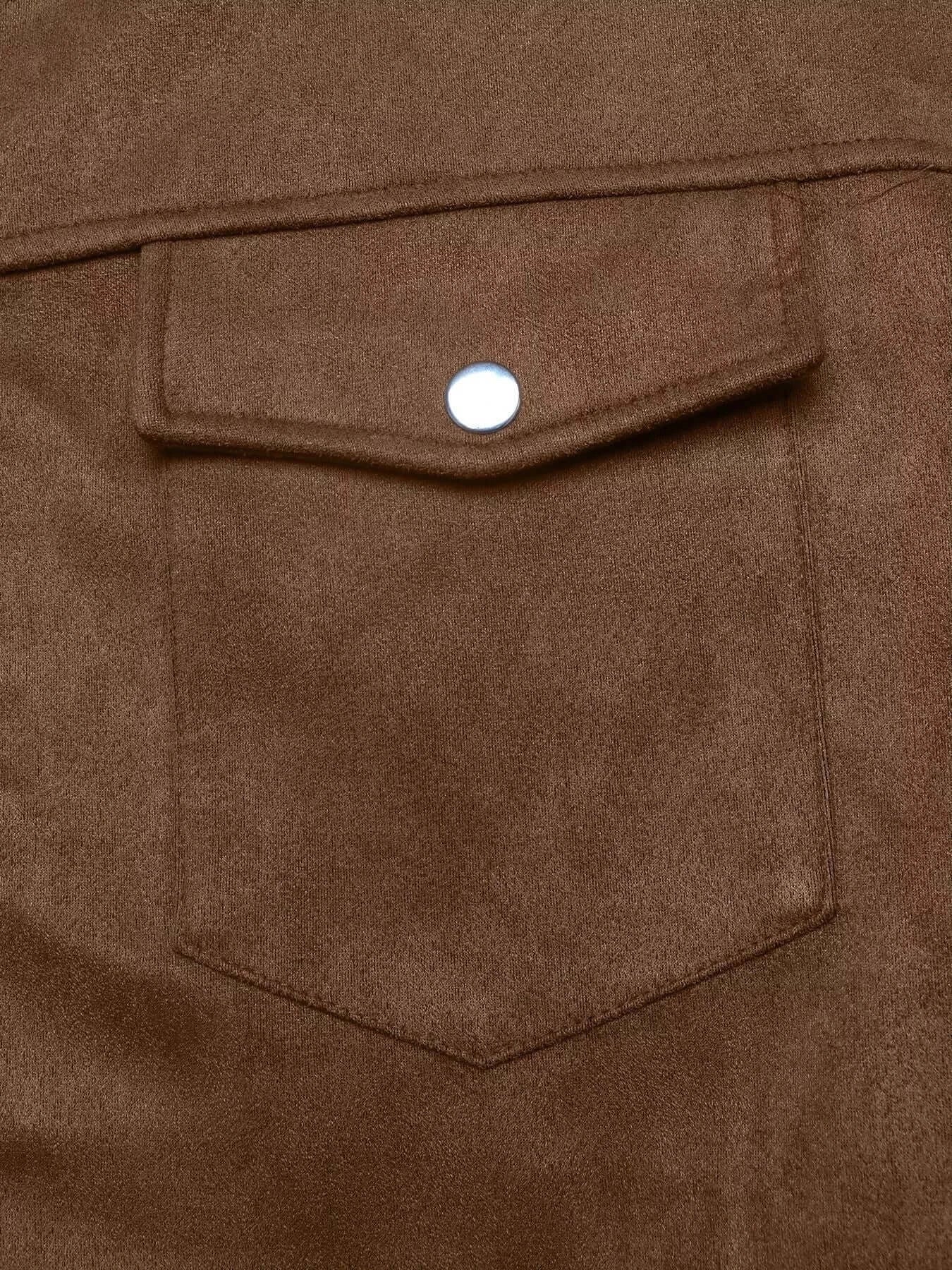 Close-up of a brown fabric pocket with a button on a garment.
