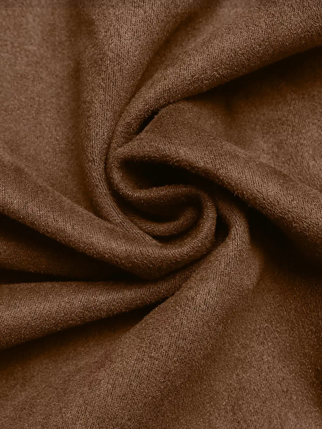 Close-up of brown fabric with folds