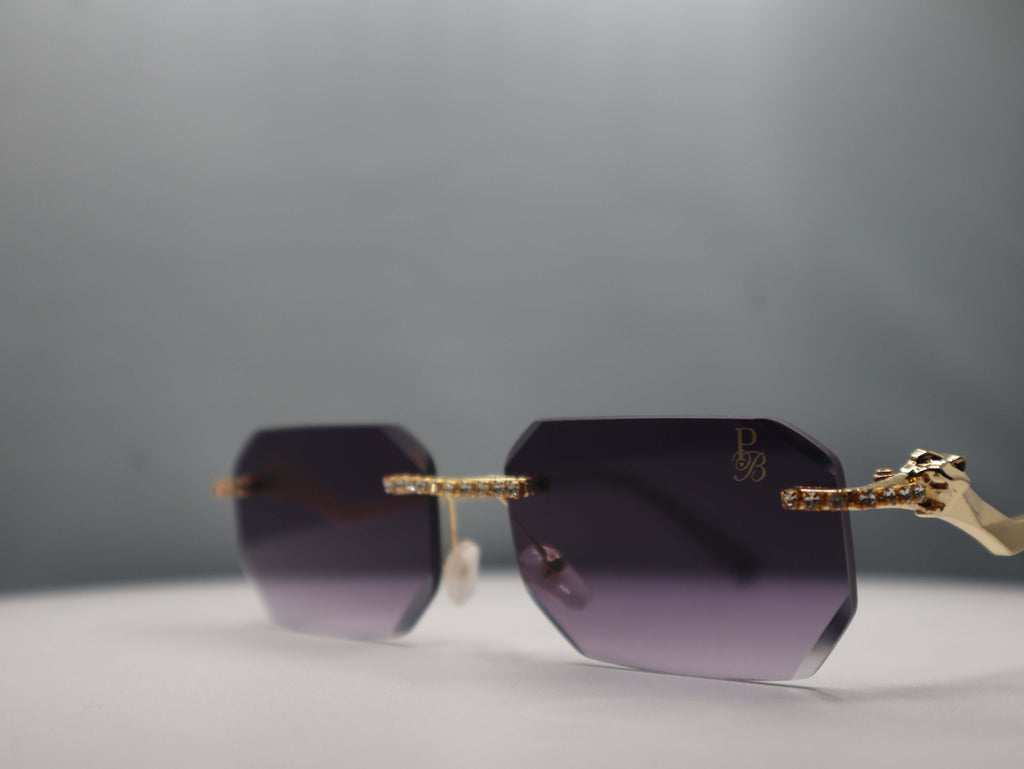 Prestige Boutique Queen Of The Jungle Women's Sunglasses with beveled frames and edgy design.