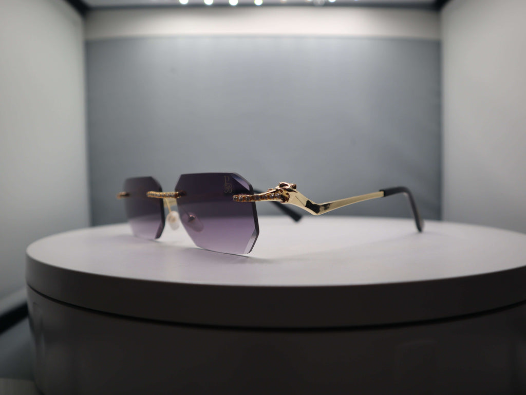 Prestige Boutique Queen Of The Jungle women's sunglasses with beveled frames and edgy design.