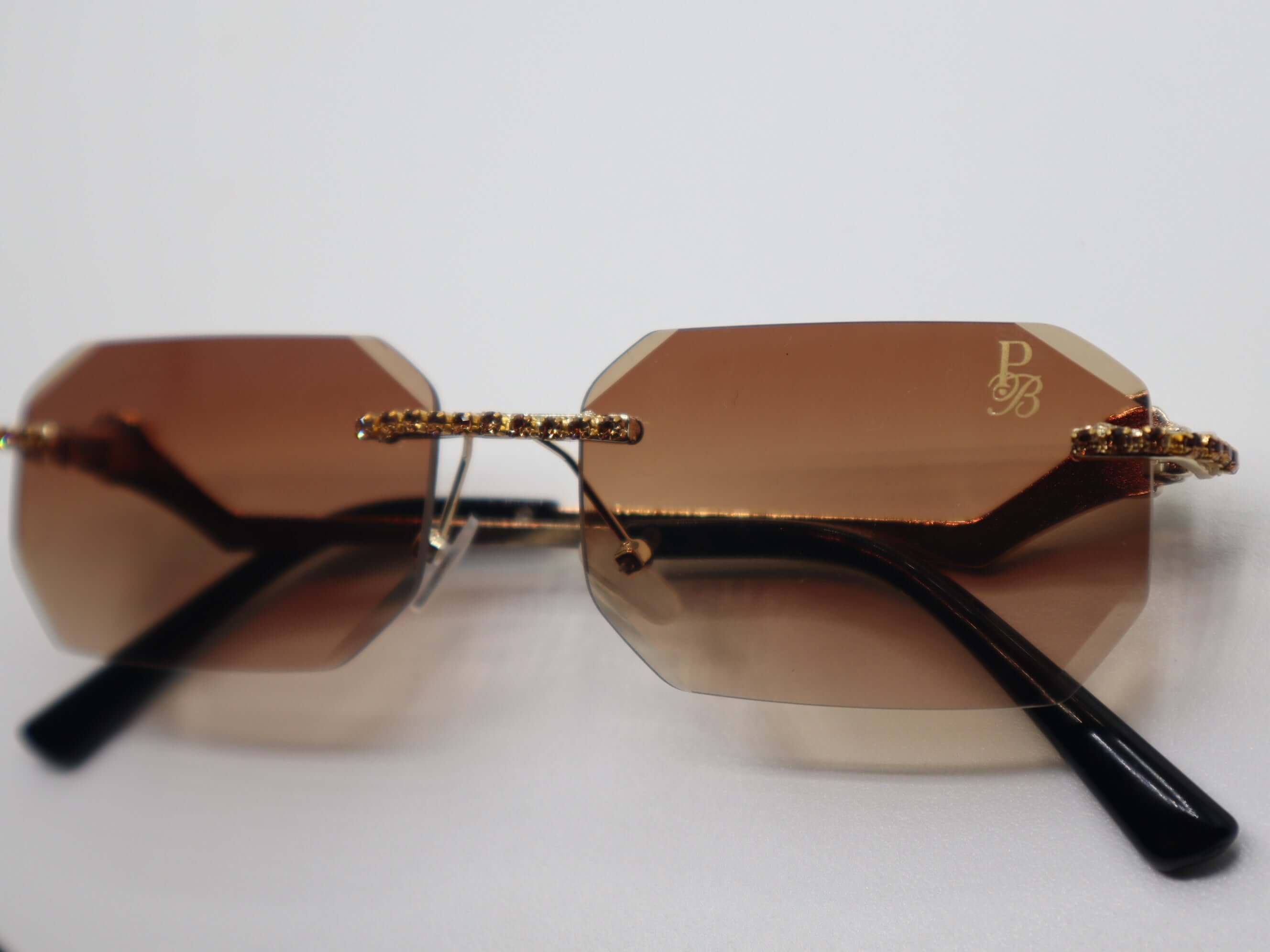 Prestige Boutique Queen Of The Jungle women's sunglasses with beveled frames and edgy design, perfect for bold fashion statements.