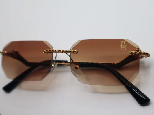 Prestige Boutique Queen Of The Jungle women's sunglasses with beveled frames and edgy design, perfect for bold fashion statements.