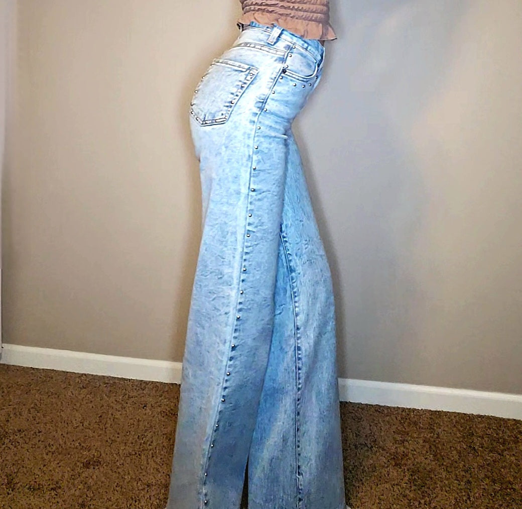 Brooklyn Studded BootCut High Rise Jeans showcasing their stylish design and fit on a model.