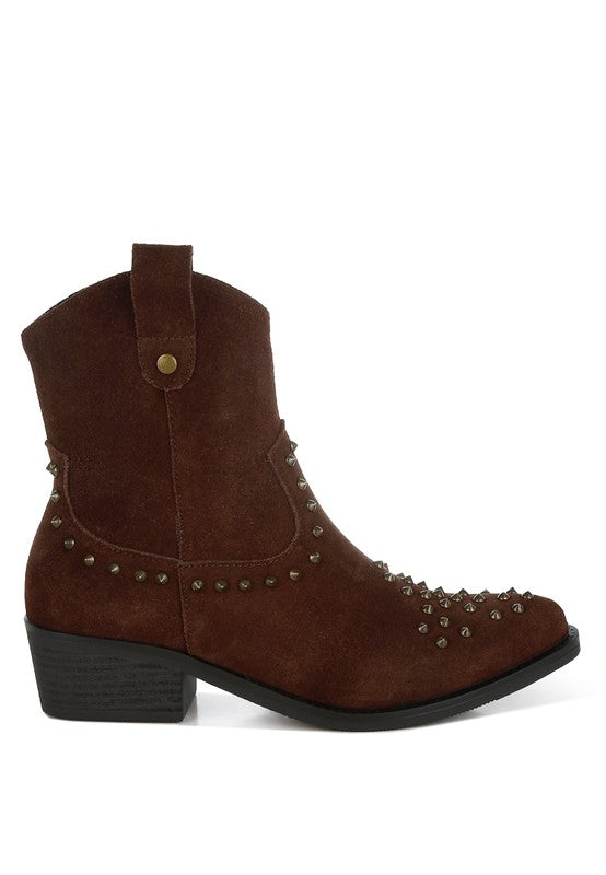 Brown cowboy boot with studded details on a white background