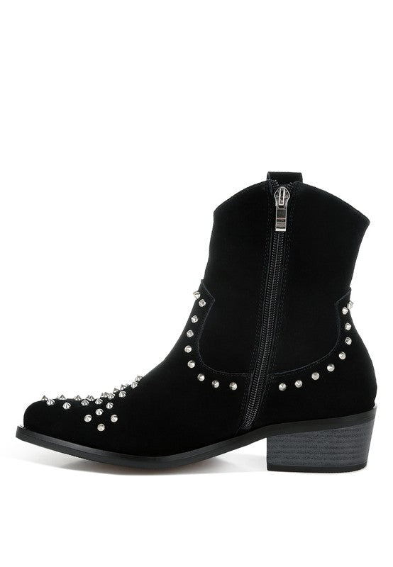 Black studded ankle boot on a white background