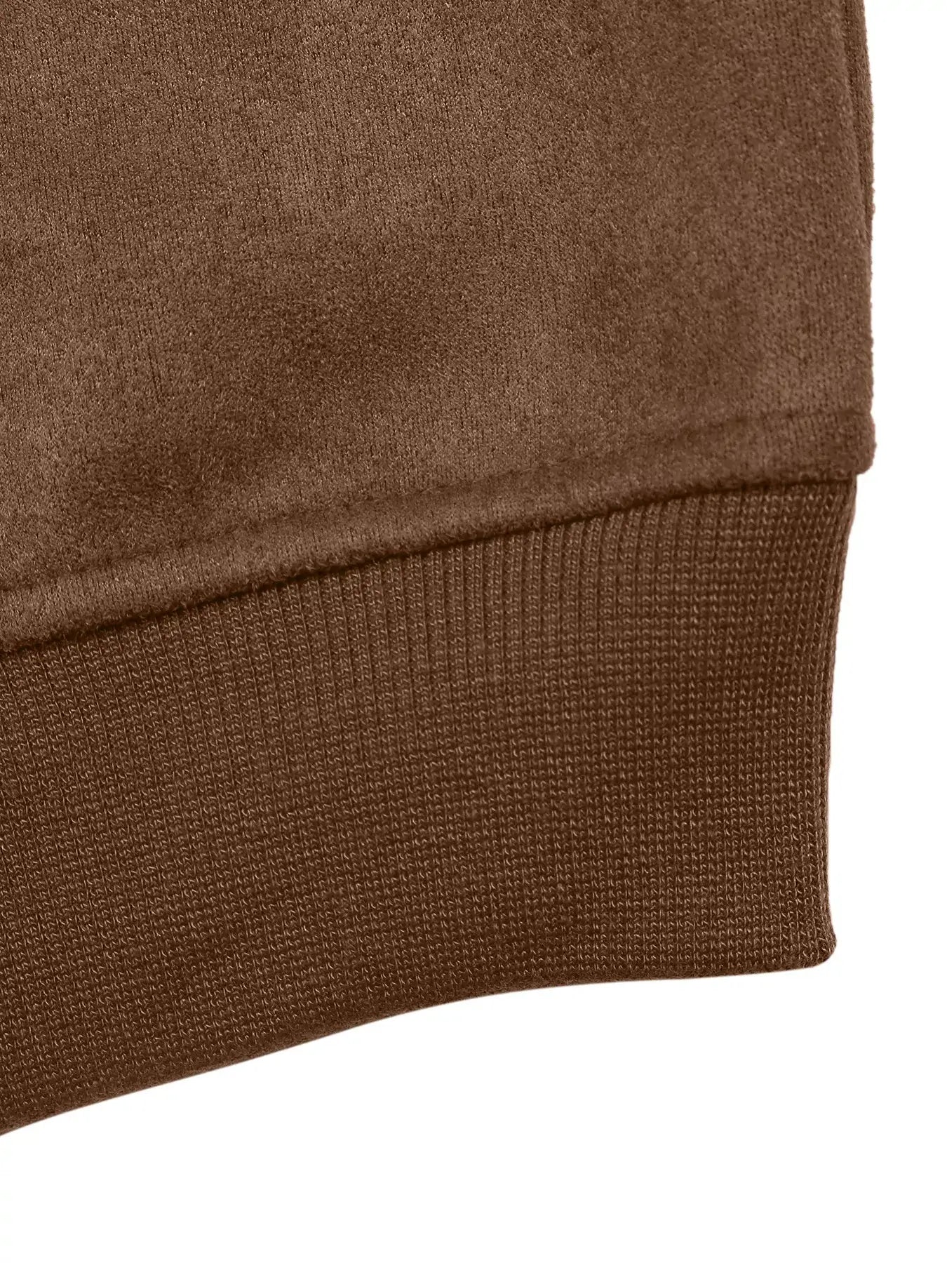 Close-up of a brown textured fabric edge on a white background